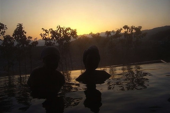 Outdoor Japanese onsen at sunrise