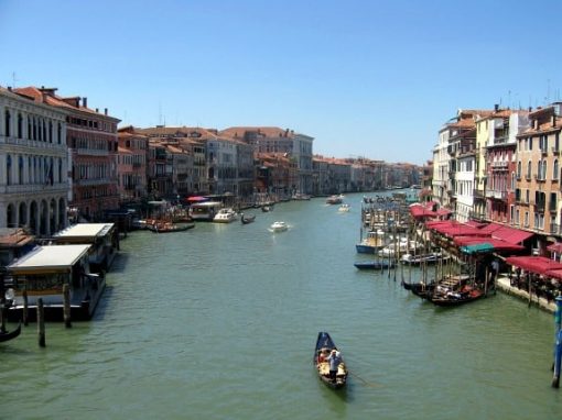 Gondola on canal in venice italy