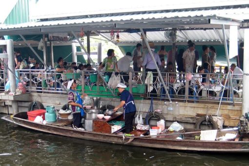 Seafood kitchen on longboat at Taling Chan market