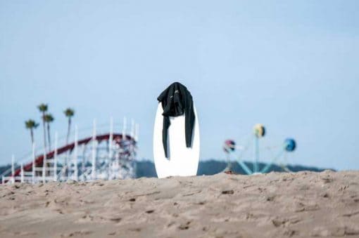 It’s winter time at the beach in Santa Cruz… with a body board in the sand and the empty boardwalk rides in the background, it looks like at least one person has enjoyed the winter surf. Via unsplash
