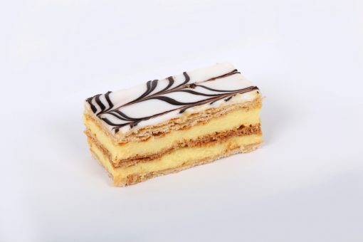 Vanilla slice (also known as mille-feuille) is made up of three layers of puff pastry with two layers of pastry cream separating the puff pastry. 