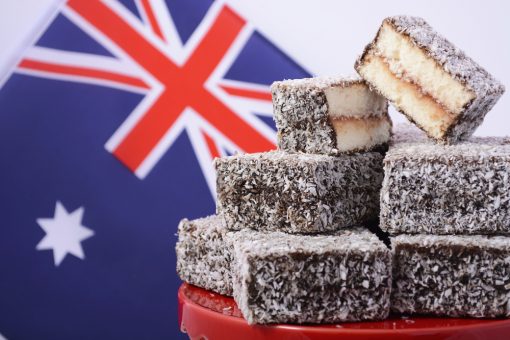 Australian cake is made from butter or sponge cake, then coated in chocolate sauce, and rolled in coconut. 