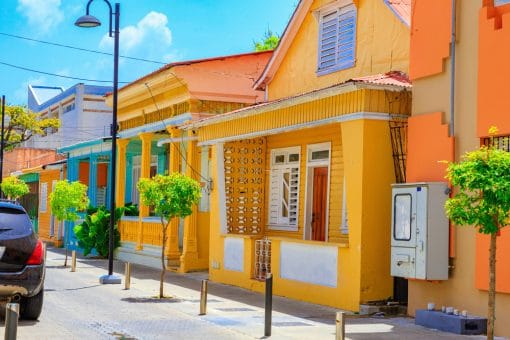bright orange house on a street in puerto plata in the dominican republic