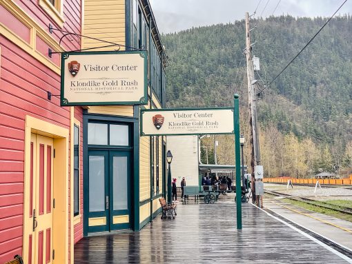 the exterior of the visitors center of the klondike gold rush national park on a rainy day